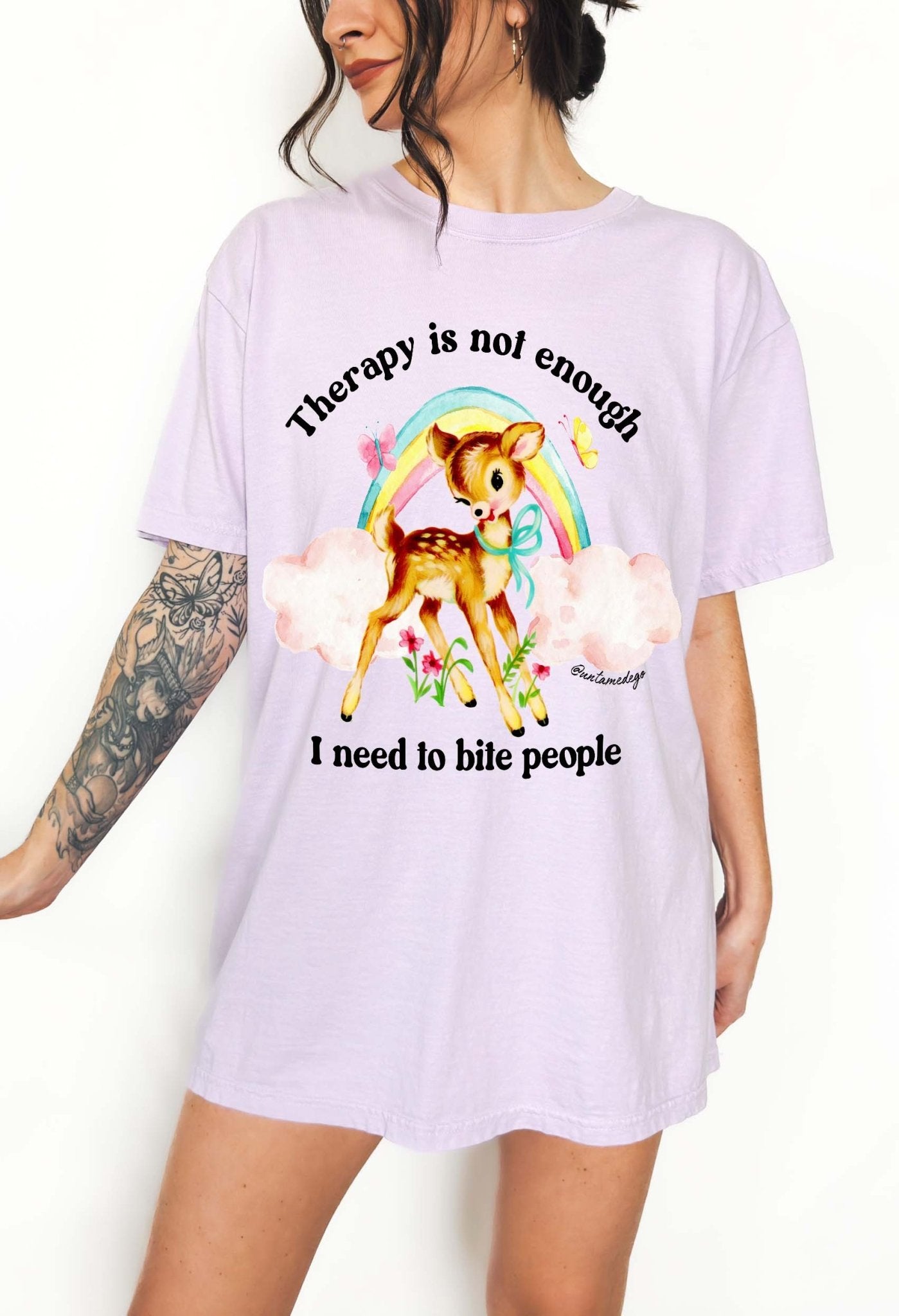 Funny graphic t-shirt with cute deer illustration and text saying therapy is not enough I need to bite people