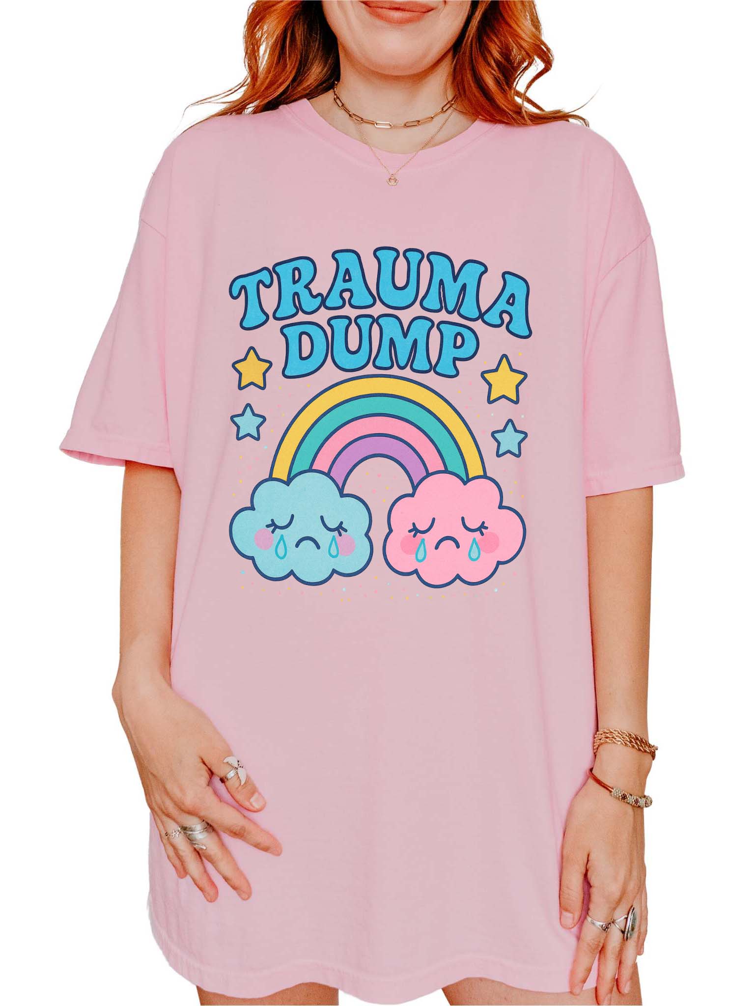 Funny graphic t-shirt with rainbow and crying clouds design and text saying trauma dump