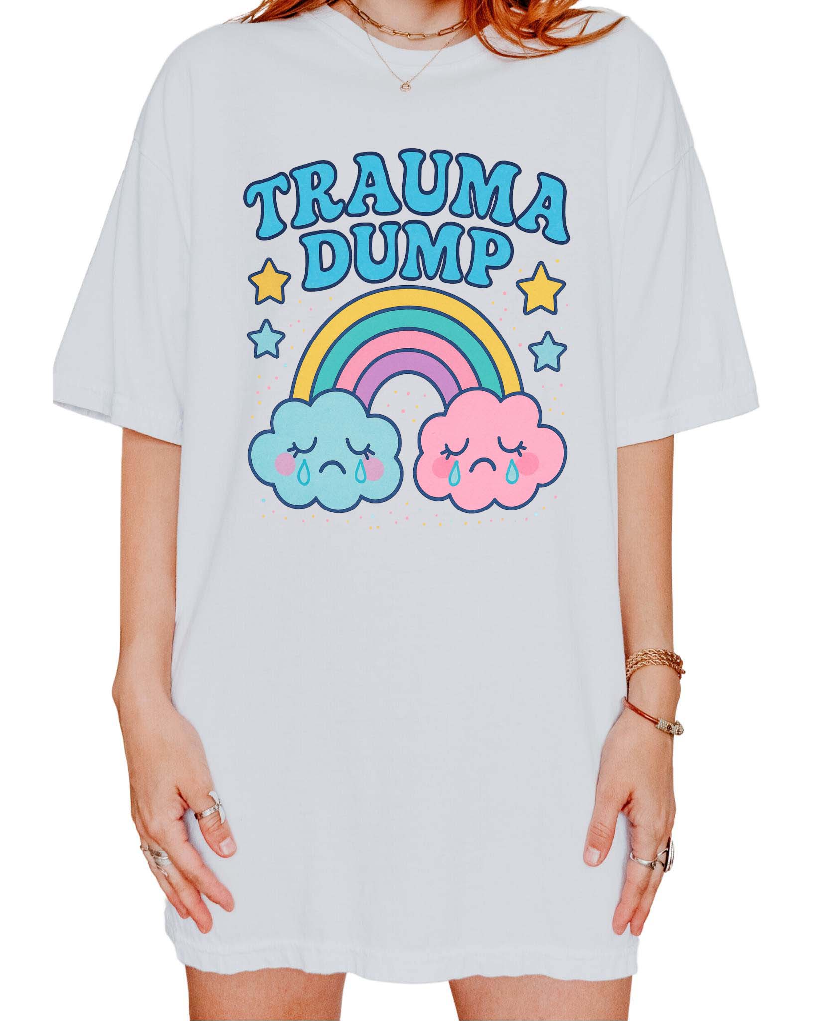 Funny graphic t-shirt with rainbow and crying clouds design and text saying trauma dump