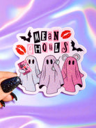 Sticker with cartoon ghosts and 'Mean Ghosts' text on a colorful background