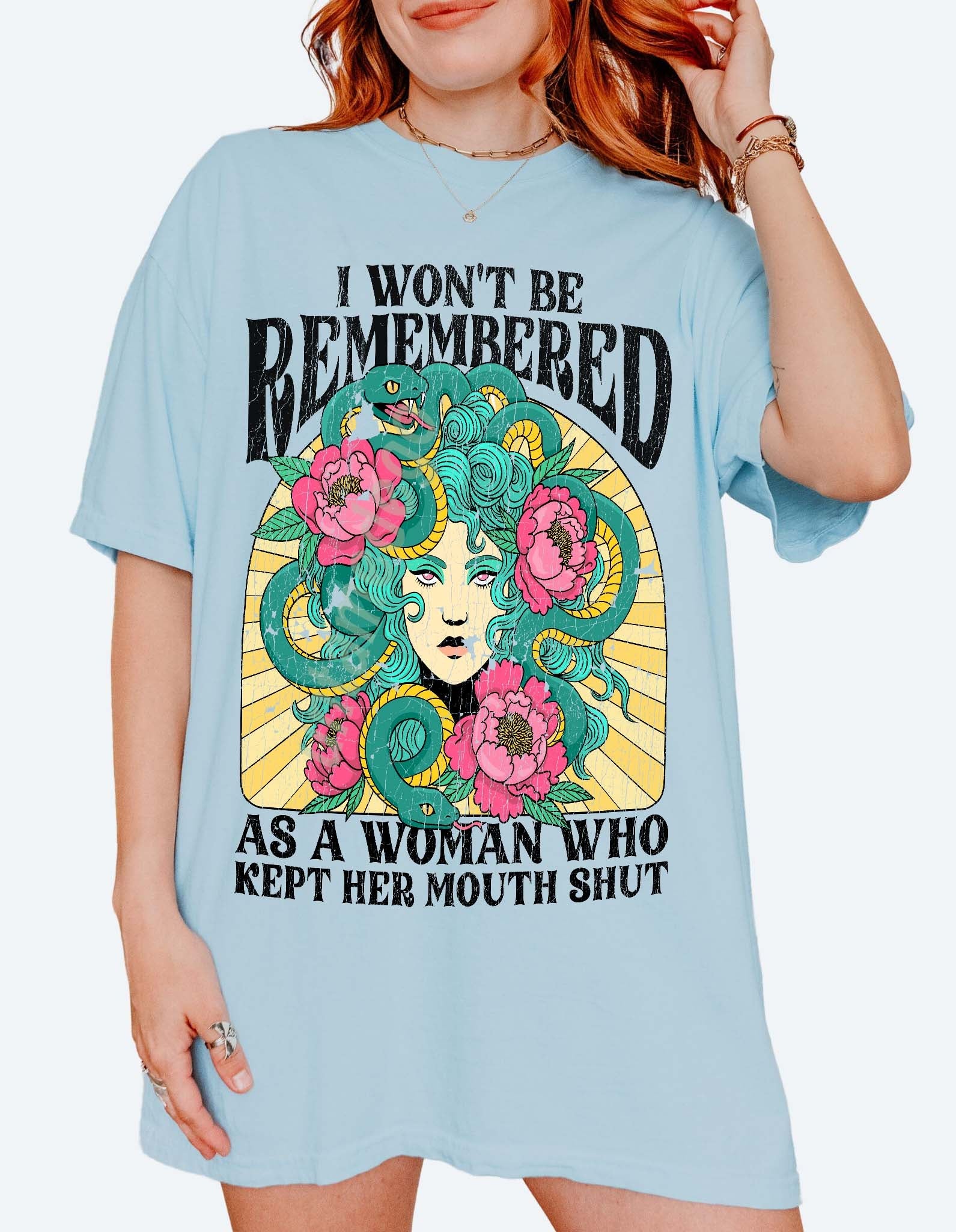 Women empowerment graphic t-shirt with Medusa design and bold feminist statement text