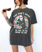 Funny dark humor t-shirt with skeleton graphic and text saying you don’t have to die to be dead to me