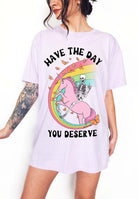 Funny sarcastic t-shirt with unicorn and skeleton design and text saying have the day you deserve